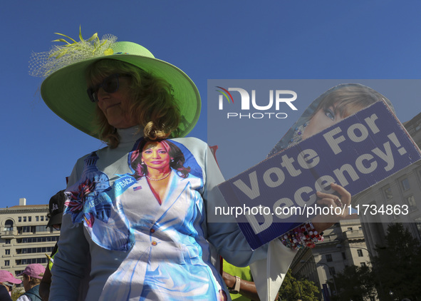 Demonstrators gather at Freedom Plaza and then march to the White House during the National Women's March ahead of the U.S. presidential ele...