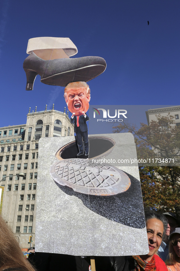 Demonstrators gather at Freedom Plaza and then march to the White House during the National Women's March ahead of the U.S. presidential ele...