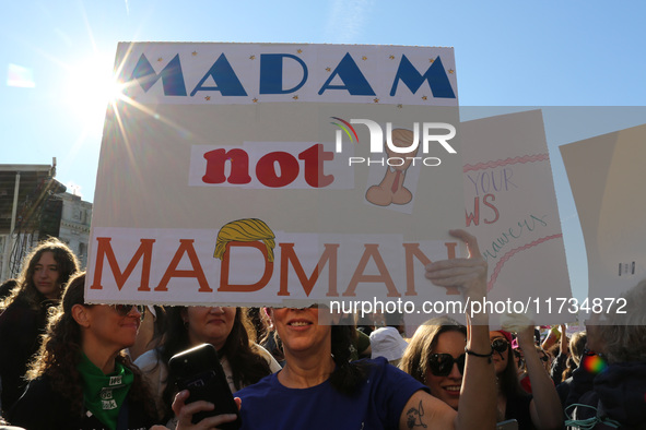 Demonstrators gather at Freedom Plaza and then march to the White House during the National Women's March ahead of the U.S. presidential ele...