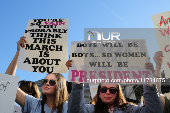 Demonstrators gather at Freedom Plaza and then march to the White House during the National Women's March ahead of the U.S. presidential ele...