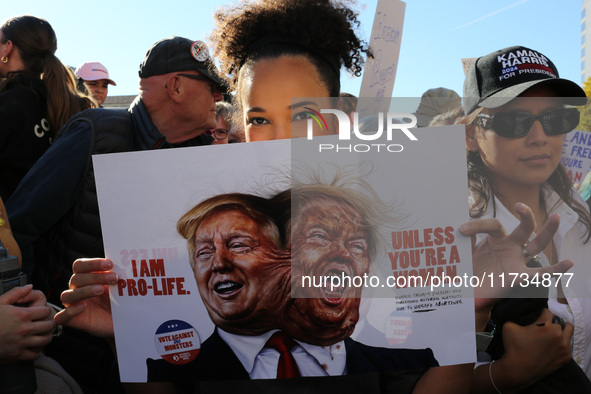 Demonstrators gather at Freedom Plaza and then march to the White House during the National Women's March ahead of the U.S. presidential ele...