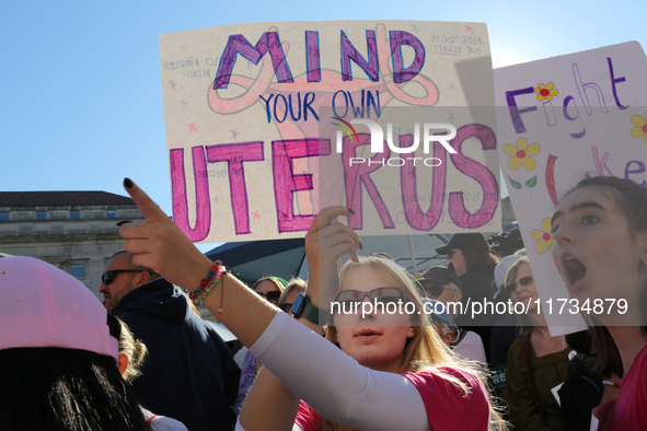 Demonstrators gather at Freedom Plaza and then march to the White House during the National Women's March ahead of the U.S. presidential ele...