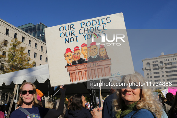 Demonstrators gather at Freedom Plaza and then march to the White House during the National Women's March ahead of the U.S. presidential ele...