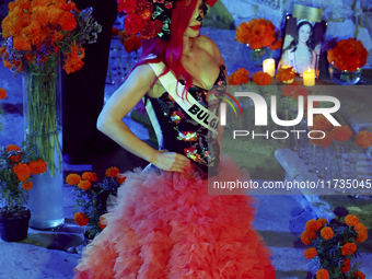 Miss Bulgaria Elena Vian walks on the runway during the Miss Universe Catrinas Gala at Antiguo Colegio de las Vizcainas in Mexico City, Mexi...