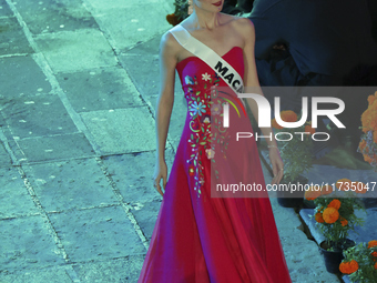 Miss Macau Cassandra Chiu walks on the runway during the Miss Universe Catrinas Gala at Antiguo Colegio de las Vizcainas in Mexico City, Mex...