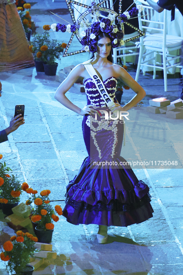 Miss Greece Christianna Katsieri walks on the runway during the Miss Universe Catrinas Gala at Antiguo Colegio de las Vizcainas in Mexico Ci...