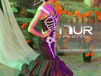 Miss Greece Christianna Katsieri walks on the runway during the Miss Universe Catrinas Gala at Antiguo Colegio de las Vizcainas in Mexico Ci...