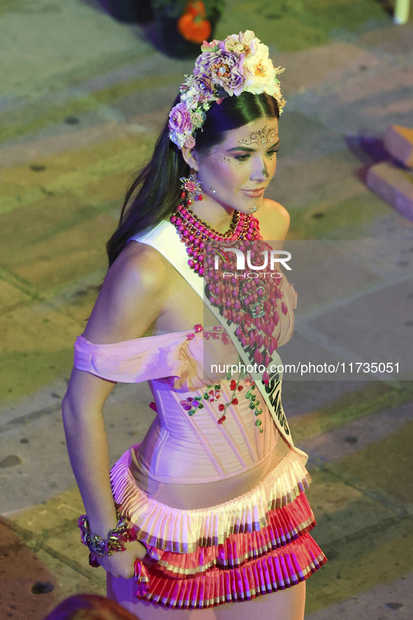 Miss Cayman Islands Raegan Rutty walks on the runway during the Miss Universe Catrinas Gala at Antiguo Colegio de las Vizcainas in Mexico Ci...