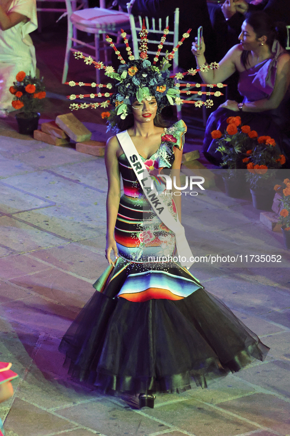 Miss Sri Lanka Melloney Dassanayake walks on the runway during the Miss Universe Catrinas Gala at Antiguo Colegio de las Vizcainas in Mexico...