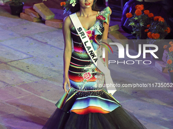 Miss Sri Lanka Melloney Dassanayake walks on the runway during the Miss Universe Catrinas Gala at Antiguo Colegio de las Vizcainas in Mexico...