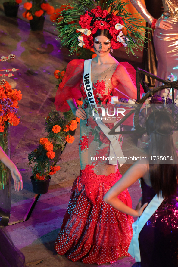 Miss Uruguay Yanina Lucas walks on the runway during the Miss Universe Catrinas Gala at Antiguo Colegio de las Vizcainas in Mexico City, Mex...