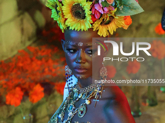 Miss Botswana Thanolo Thato walks on the runway during the Miss Universe Catrinas Gala at Antiguo Colegio de las Vizcainas in Mexico City, M...