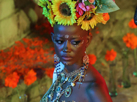 Miss Botswana Thanolo Thato walks on the runway during the Miss Universe Catrinas Gala at Antiguo Colegio de las Vizcainas in Mexico City, M...