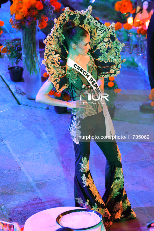 Miss Czech Republic Marie Danci walks on the runway during the Miss Universe Catrinas Gala at Antiguo Colegio de las Vizcainas in Mexico Cit...