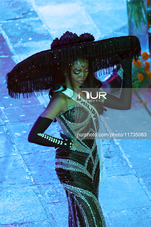 Miss Philippines Chelsea Anne Manalo walks on the runway during the Miss Universe Catrinas Gala at Antiguo Colegio de las Vizcainas in Mexic...