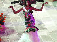 Miss Namibia Prisca Anyolo walks on the runway during the Miss Universe Catrinas Gala at Antiguo Colegio de las Vizcainas in Mexico City, Me...