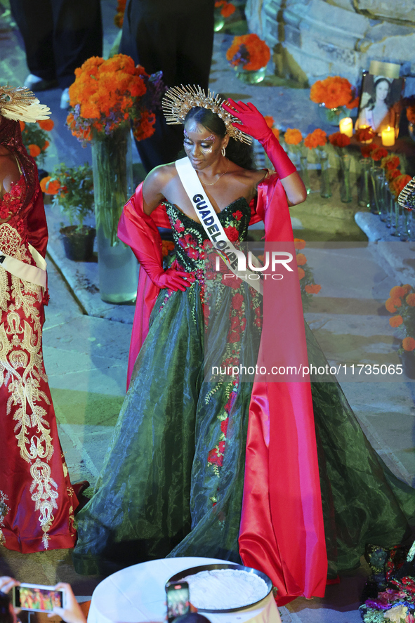 Miss Guadeloupe Coraly Desplan walks on the runway during the Miss Universe Catrinas Gala at Antiguo Colegio de las Vizcainas in Mexico City...