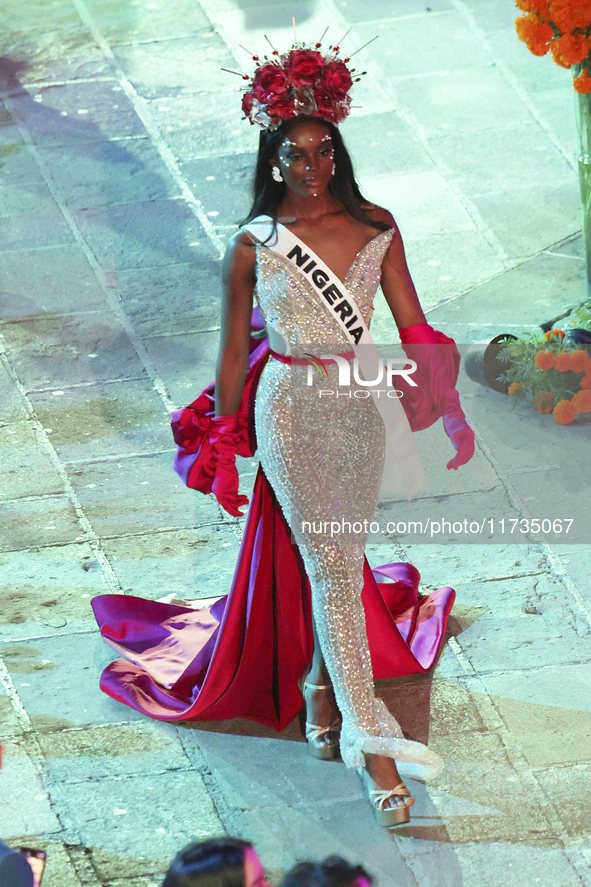 Miss Nigeria Chidimma Adetshina walks on the runway during the Miss Universe Catrinas Gala at Antiguo Colegio de las Vizcainas in Mexico Cit...