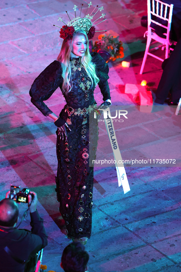 Miss Switzerland Laura Bircher walks on the runway during the Miss Universe Catrinas Gala at Antiguo Colegio de las Vizcainas in Mexico City...