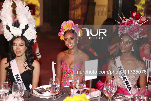 Miss Turks and Caicos Islands Raynae Myers and Miss Nigeria Chidimma Adetshina attend the Miss Universe Catrinas Gala at Antiguo Colegio de...