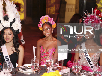 Miss Turks and Caicos Islands Raynae Myers and Miss Nigeria Chidimma Adetshina attend the Miss Universe Catrinas Gala at Antiguo Colegio de...