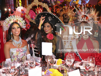 (L-R) Miss El Salvador Florence Gisselle Garcia, Miss Nicaragua Geyssell Garcia, and Miss Netherlands Faith Landman attend the Miss Universe...