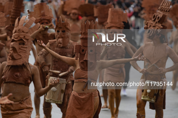 Participants take part in the 2024 Annual Day of the Dead Mega Parade on Reforma Avenue, with a route from Chapultepec to the main square Zo...