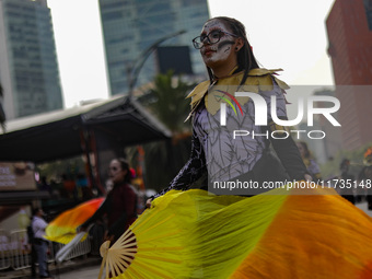 Participants take part in the 2024 Annual Day of the Dead Mega Parade on Reforma Avenue, with a route from Chapultepec to the main square Zo...