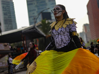 Participants take part in the 2024 Annual Day of the Dead Mega Parade on Reforma Avenue, with a route from Chapultepec to the main square Zo...