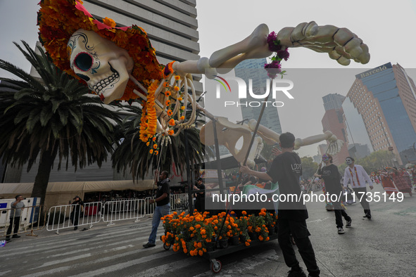 Participants take part in the 2024 Annual Day of the Dead Mega Parade on Reforma Avenue, with a route from Chapultepec to the main square Zo...