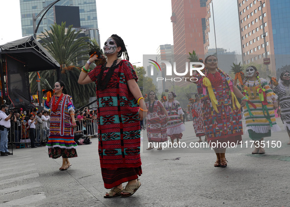 Participants take part in the 2024 Annual Day of the Dead Mega Parade on Reforma Avenue, with a route from Chapultepec to the main square Zo...