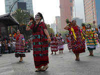 Participants take part in the 2024 Annual Day of the Dead Mega Parade on Reforma Avenue, with a route from Chapultepec to the main square Zo...