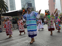 Participants take part in the 2024 Annual Day of the Dead Mega Parade on Reforma Avenue, with a route from Chapultepec to the main square Zo...