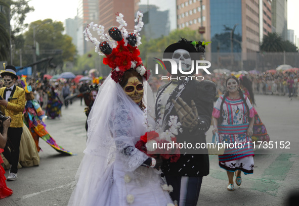 Participants take part in the 2024 Annual Day of the Dead Mega Parade on Reforma Avenue, with a route from Chapultepec to the main square Zo...