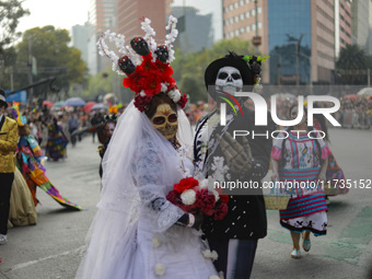 Participants take part in the 2024 Annual Day of the Dead Mega Parade on Reforma Avenue, with a route from Chapultepec to the main square Zo...