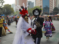 Participants take part in the 2024 Annual Day of the Dead Mega Parade on Reforma Avenue, with a route from Chapultepec to the main square Zo...