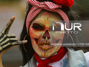 Participants take part in the 2024 Annual Day of the Dead Mega Parade on Reforma Avenue, with a route from Chapultepec to the main square Zo...