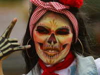 Participants take part in the 2024 Annual Day of the Dead Mega Parade on Reforma Avenue, with a route from Chapultepec to the main square Zo...