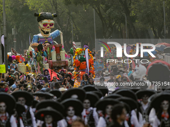 Participants take part in the 2024 Annual Day of the Dead Mega Parade on Reforma Avenue, with a route from Chapultepec to the main square Zo...