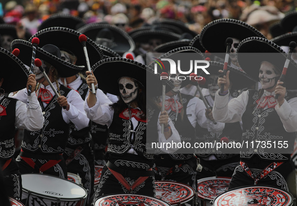 Participants take part in the 2024 Annual Day of the Dead Mega Parade on Reforma Avenue, with a route from Chapultepec to the main square Zo...