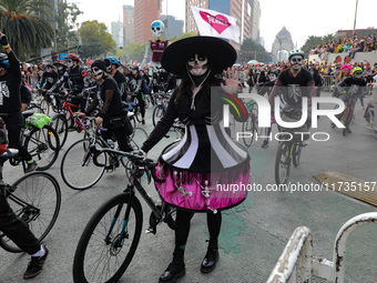 Participants take part in the 2024 Annual Day of the Dead Mega Parade on Reforma Avenue, with a route from Chapultepec to the main square Zo...