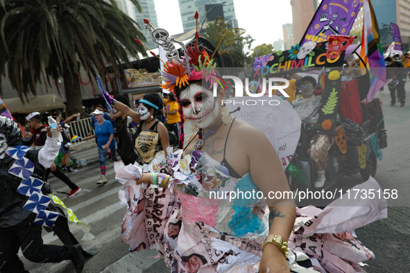 Participants take part in the 2024 Annual Day of the Dead Mega Parade on Reforma Avenue, with a route from Chapultepec to the main square Zo...