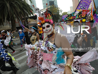 Participants take part in the 2024 Annual Day of the Dead Mega Parade on Reforma Avenue, with a route from Chapultepec to the main square Zo...