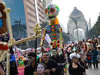 Participants take part in the 2024 Annual Day of the Dead Mega Parade on Reforma Avenue, with a route from Chapultepec to the main square Zo...