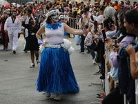 Participants take part in the 2024 Annual Day of the Dead Mega Parade on Reforma Avenue, with a route from Chapultepec to the main square Zo...