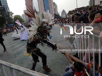 Participants take part in the 2024 Annual Day of the Dead Mega Parade on Reforma Avenue, with a route from Chapultepec to the main square Zo...