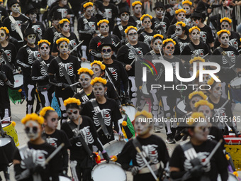 Participants take part in the 2024 Annual Day of the Dead Mega Parade on Reforma Avenue, with a route from Chapultepec to the main square Zo...