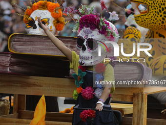 Participants take part in the 2024 Annual Day of the Dead Mega Parade on Reforma Avenue, with a route from Chapultepec to the main square Zo...