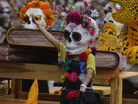 Participants take part in the 2024 Annual Day of the Dead Mega Parade on Reforma Avenue, with a route from Chapultepec to the main square Zo...