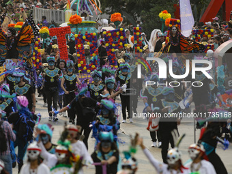 Participants take part in the 2024 Annual Day of the Dead Mega Parade on Reforma Avenue, with a route from Chapultepec to the main square Zo...